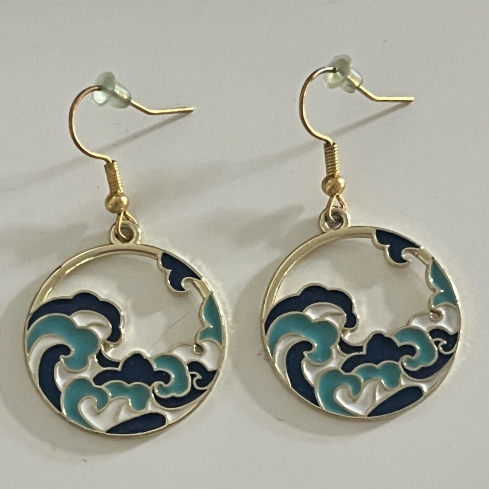 Elegant Wave Design Earrings in Gold and Blue